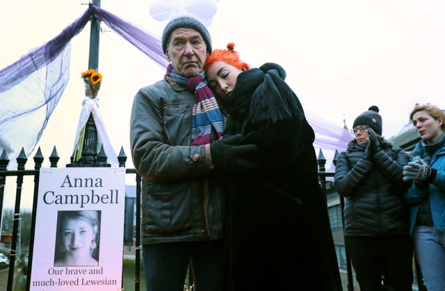 Dirk and Rose Campbell, father and sister of Anna Campbell at a vigil in Lewes (Gareth Fuller/PA)