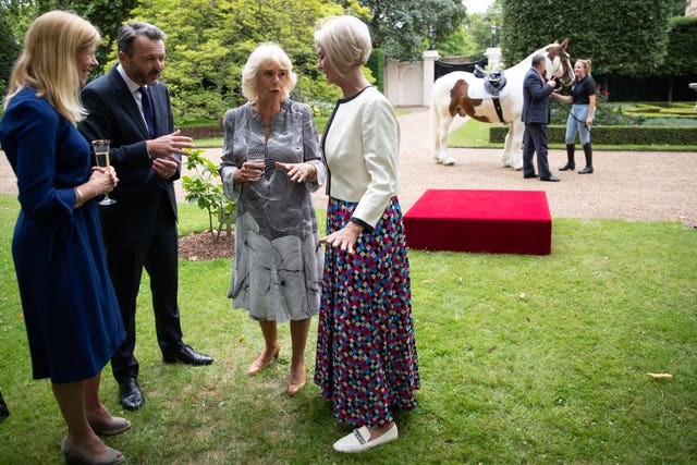 Camilla and guests