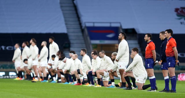 England players take a knee before facing Scotland