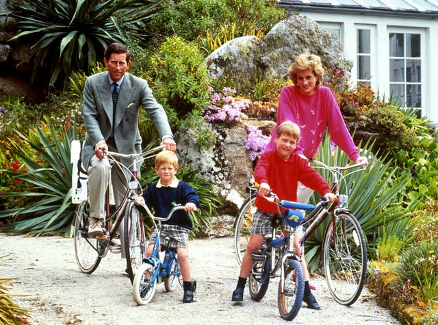 The Prince and Princess of Wales with sons William Harry on cycling trip in Tresco in 1989 (PA)