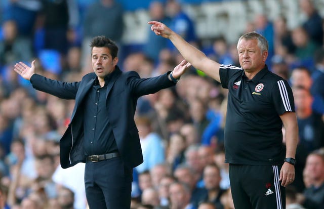 Marco Silva,left, came off second best against Sheffield United boss Chris Wilder