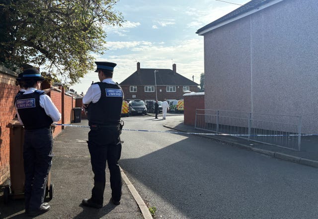 Police on a road in Bootle
