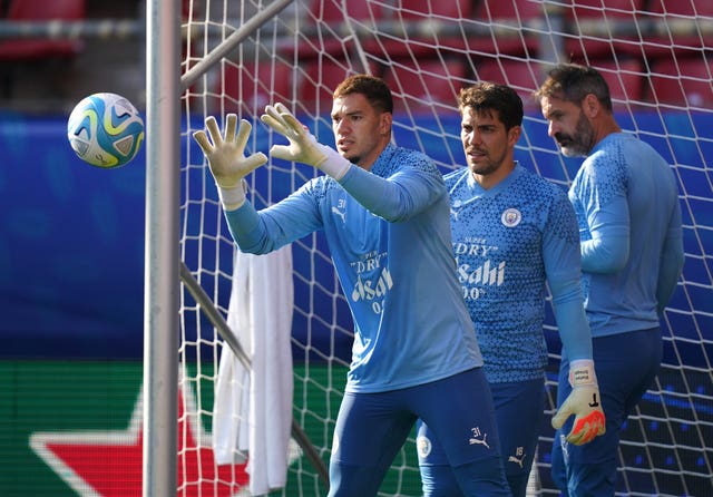 Manchester City goalkeepers Ederson, Stefan Ortega and Scott Carson during a training session (Adam Davy)