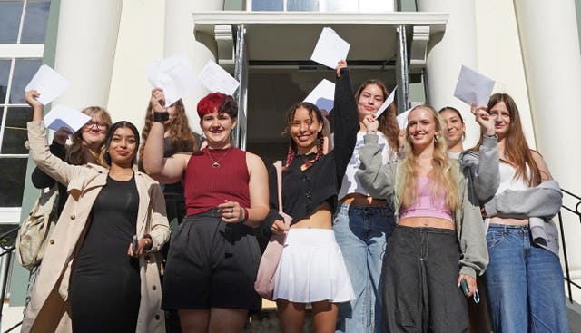 Students at Brighton Girls school in East Sussex, receive their A-level results