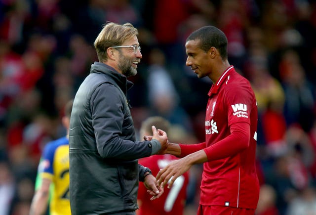Jurgen Klopp could welcome back Joel Matip, right, at the weekend