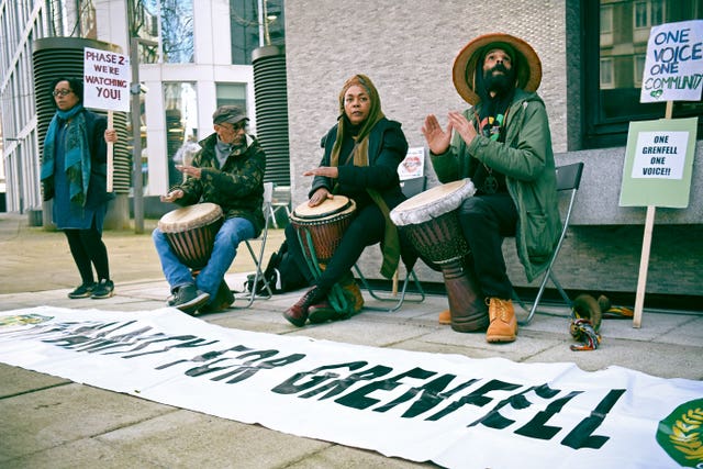 Protesters outside the Grenfell Tower public inquiry