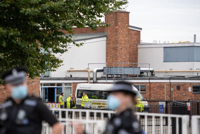 Police officers outside Kesgrave High School