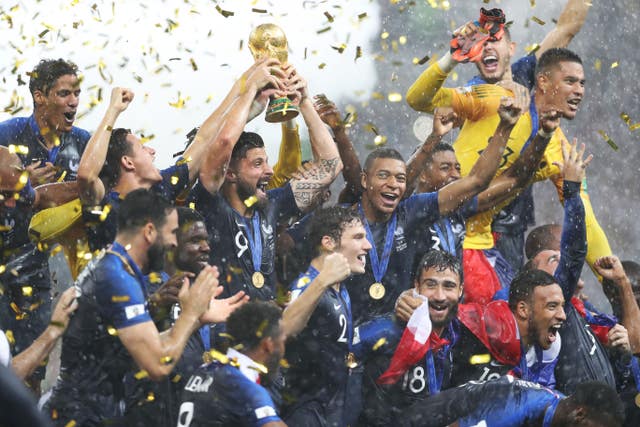 France celebrate with the trophy after winning the 2018 World Cup final in Moscow