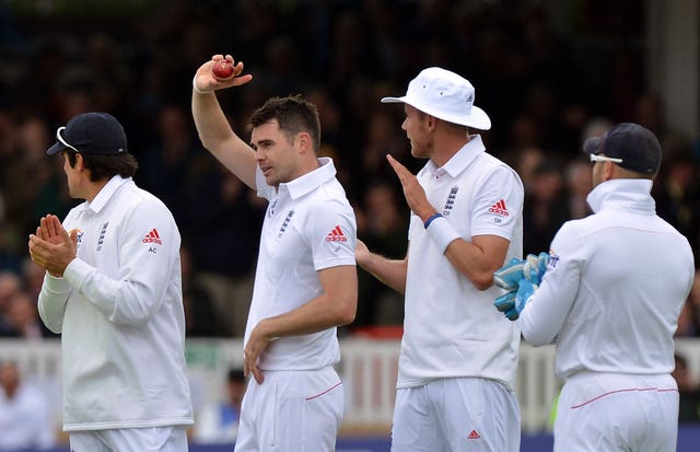 James Anderson holds the ball aloft after taking his 300th Test wicket