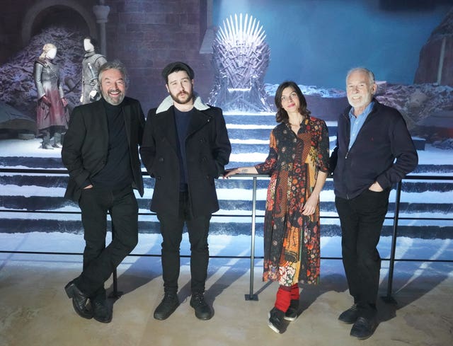 Left to right, cast members Ian Beattie, Daniel Portman, Natalia Tena and Ian McElhinney pose for photos during a preview day of the Game Of Thrones Studio Tour at the Linen Mill Studios in Banbridge, Northern Ireland