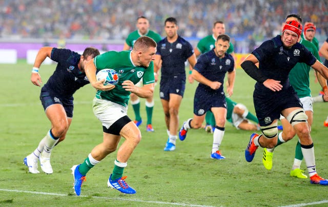 Andrew Conway (with the ball) scored Ireland's fourth try against Scotland (Adam Davy/PA).