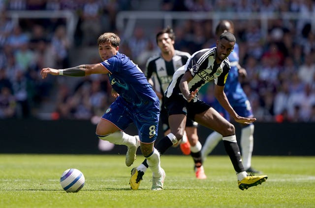 Newcastle’s Alexander Isak (right) and Chelsea’s Enzo Fernandez (left) battle for the ball during the Premier League match at St James’ Park