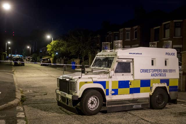 Police at the scene of a attack on the west Belfast home of former Sinn Fein leader Gerry Adams 