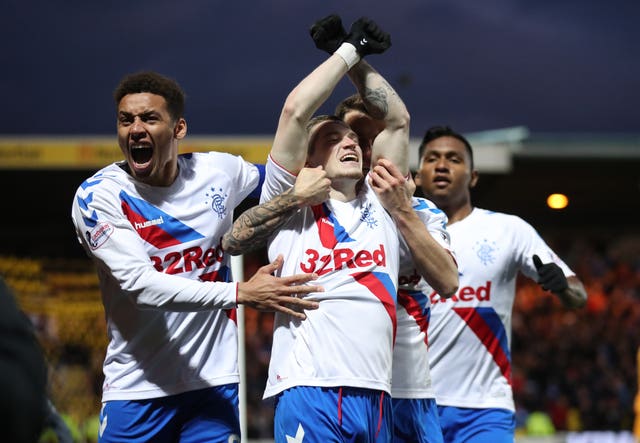 Rangers winger Ryan Kent (centre) celebrates his strike at Livingston