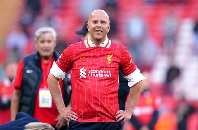 Liverpool head coach Arne Slot stands with hands on hips