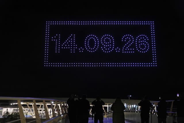 A drone light show over the Joie Stadium football ground at the Etihad Campus in Manchester appears to give away the date of the forthcoming Oasis tour date announcement (Peter Byrne/PA)