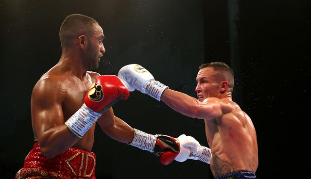 Josh Warrington beat Kid Galahad to retain his IBF world featherweight title in Leeds