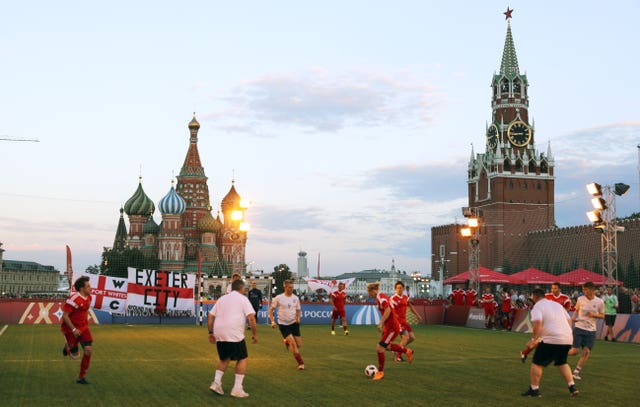 England and Russia fans play a match in the fan area of Red Square, Moscow