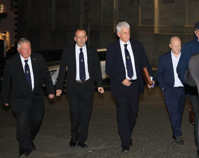 Nigel Dawson, the district master of the Orange Order in Portadown, (third left) and legal adviser to the Orange Order and spokesperson Jamie Bryson (right) arrive at Hillsborough Castle