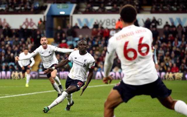 Sadio Mane scored a stoppage-time winners as Premier League leaders Liverpool beat Aston Villa 2-1 on Saturday afternoon