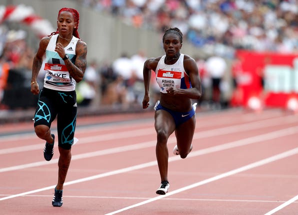Great Britain’s Dina Asher-Smith (right) in her heat at the Anniversary Games