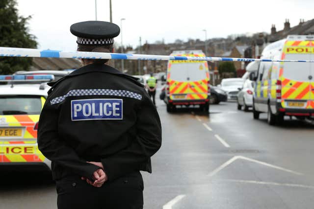 Police activity outside an address in Savile Town, Dewsbury, (Aaron Chown/PA)