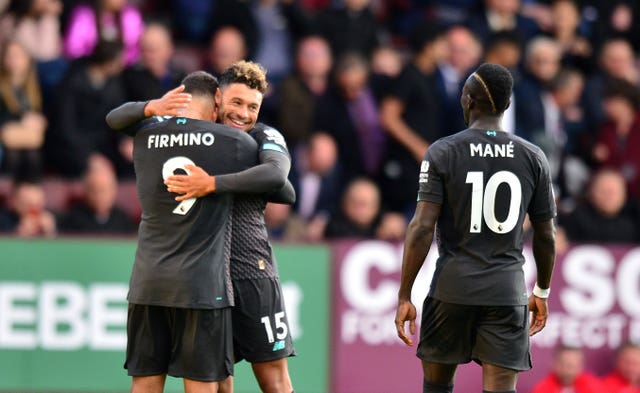 Firmino celebrates his goal at Turf Moor 