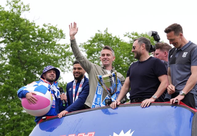 Kieran McKenna, centre, has guided Ipswich into the Premier League with back-to-back promotions