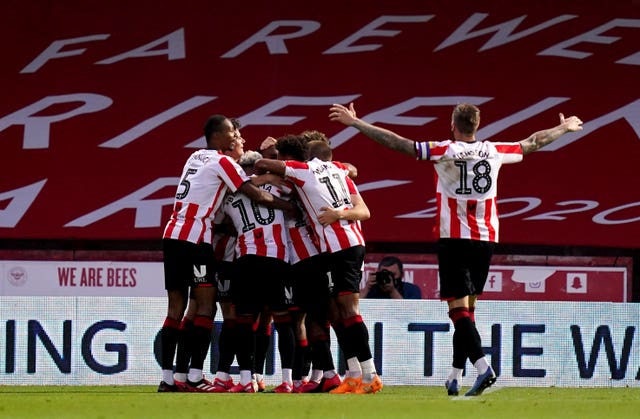 Bryan Mbeumo (obscured) made it three after the break 