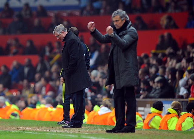 Jose Mourinho celebrates Real Madrid scoring against Sir Alex Ferguson's United