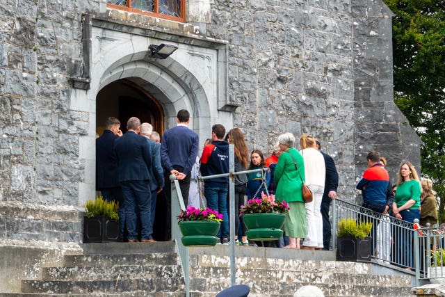 Mourners fill the church at the funeral for Vanessa Whyte and her children