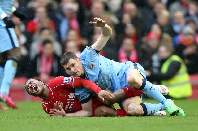 James Milner, right, fouls Raheem Sterling. The two have now swapped over, with Sterling at City and Milner with Liverpool