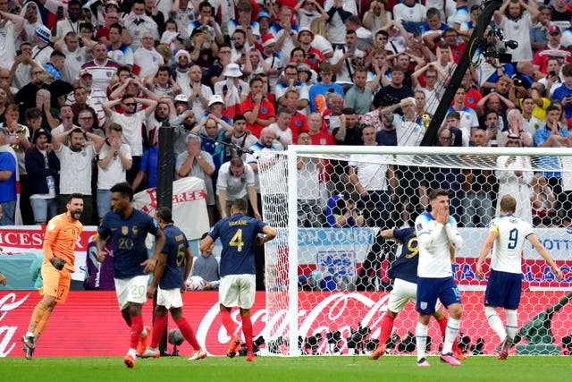 France goalkeeper Hugo Lloris, (left) celebrates after Harry Kane's penalty miss