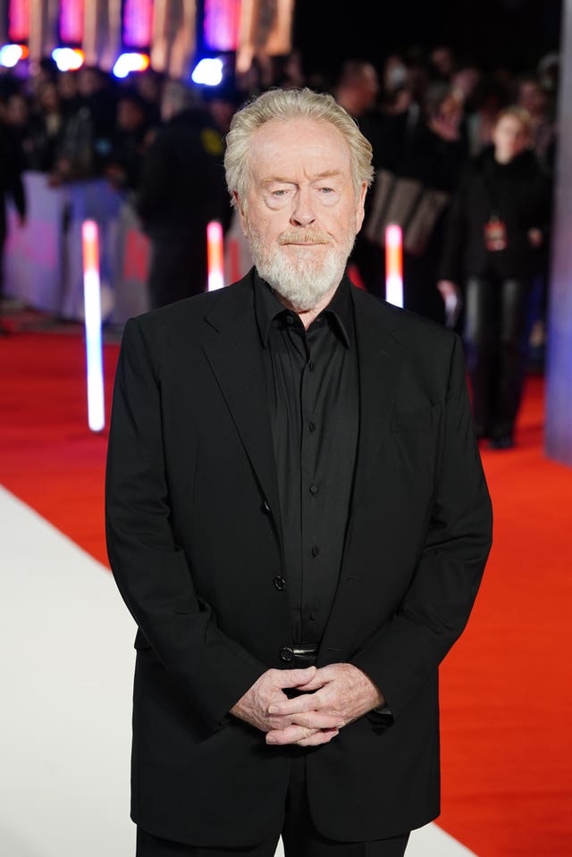 Ridley Scott wearing a black suit at the UK premiere of Napoleon