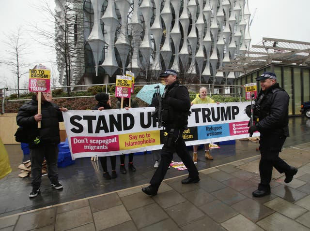Anti-Trump protesters outside the new US Embassy in Nine Elms, London (PA)