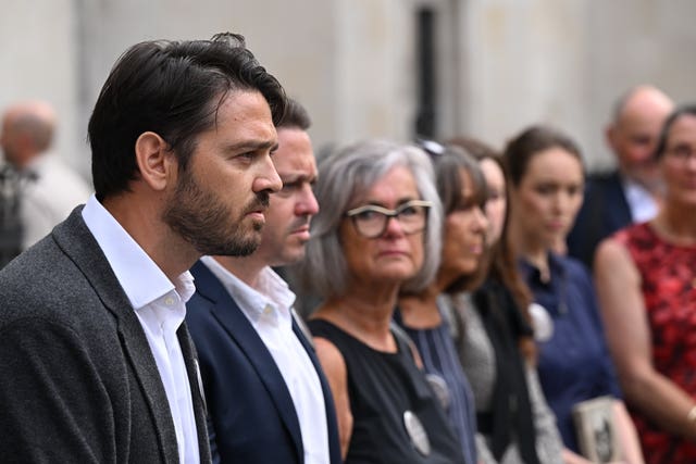 Families from the Chinook Justice Campaign outside the Royal Courts of Justice, central London