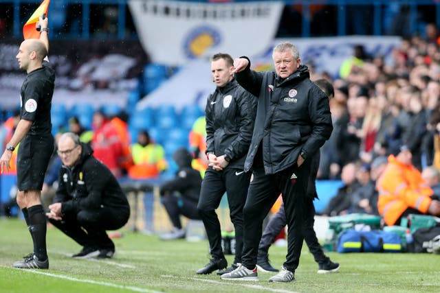 Sheffield United manager Chris Wilder, right, got the better of Leeds boss Marcelo Bielsa, second left, in the Championship
