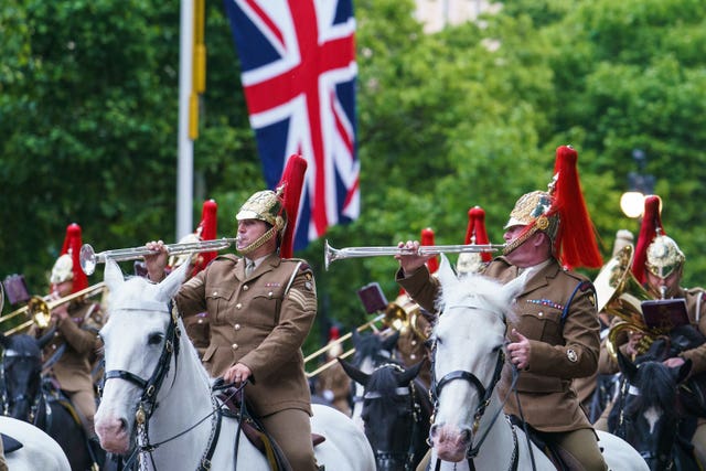 Troops of the Household Cavalry on The Mall, during an early morning rehearsal as service personnel from the Royal Navy, British Army, and Royal Air Force conduct a final early morning rehearsal through London ahead of Sunday’s Platinum Jubilee Pageant, which will mark the finale of the Platinum Jubilee Weekend