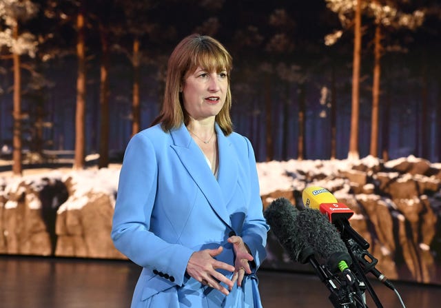 Chancellor Rachel Reeves in front of microphones during a visit to Studio Ulster in Belfast