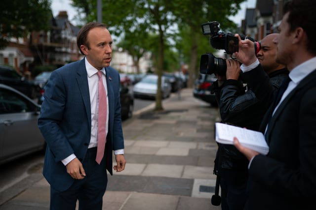 Health Secretary Matt Hancock speaks to the media outside his home in north-west London