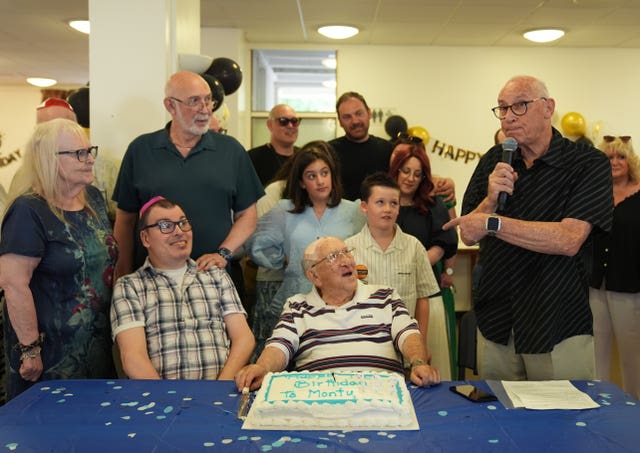 Monty Goldstein with family members