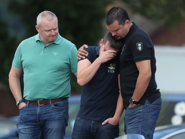 Police colleagues paying tribute to Pc Harper at the scene of his death