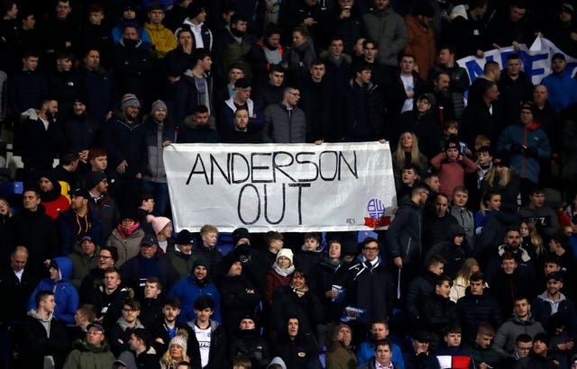 Bolton fans protest against Ken Anderson during a Championship match this season