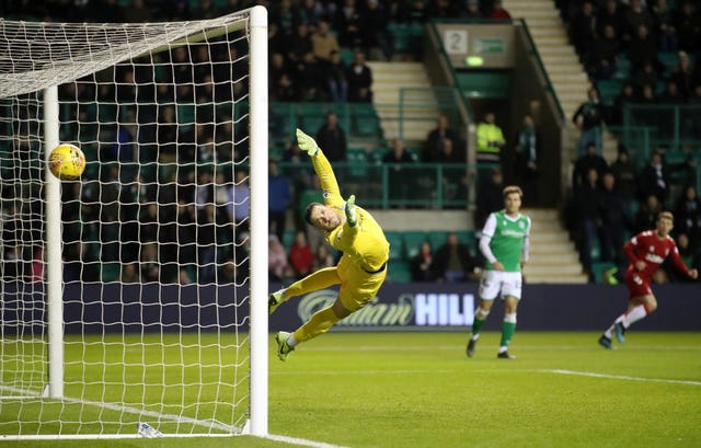 Hibernian keeper Ofir Marciano is beaten by Joe Aribo, not pictured, for Rangers'' second