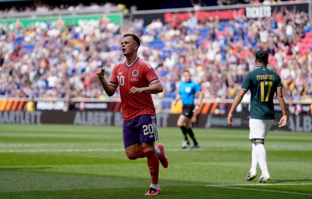 Lawrence Shankland celebrates his goal against Bolivia