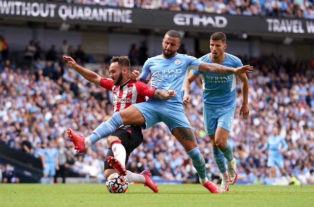 Kyle Walker challenges Southampton’s Adam Armstrong