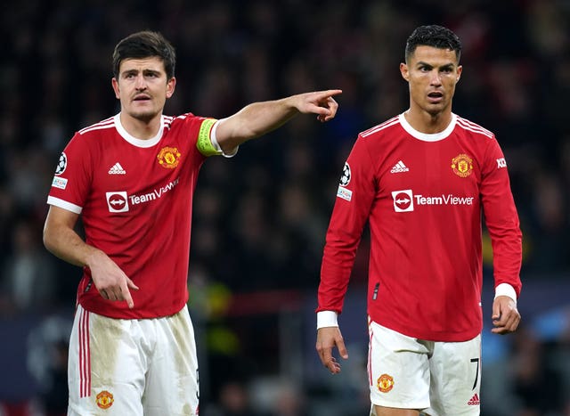 Manchester United captain Harry Maguire (left) and Cristiano Ronaldo