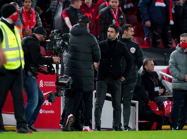 Arsenal boss Mikel Arteta (right) and Liverpool manager Jurgen Klopp 