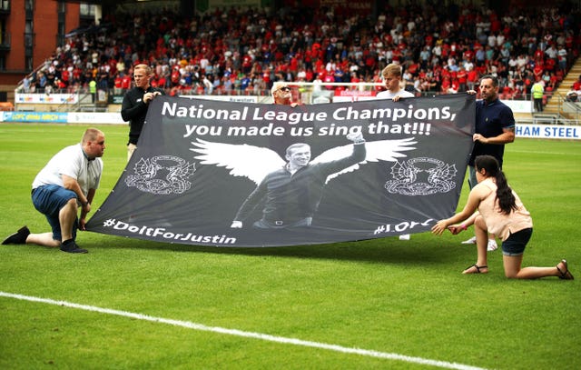 Leyton Orient fans pay tribute to Justin Edinburgh ahead of their first game back in the EFL