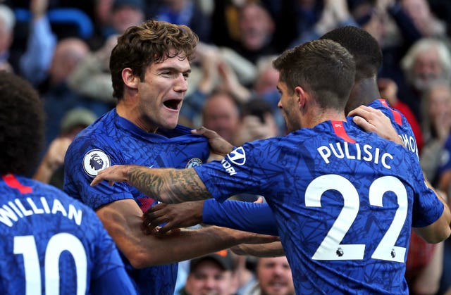 Marcos Alonso celebrates his winner with Christian Pulisic